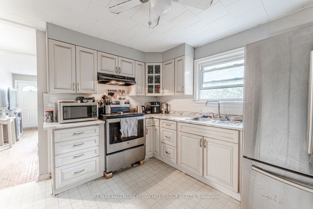 Photo of 34/36 Centre Street, Essa, ON L0M 1B0 (MLS # N12755100)