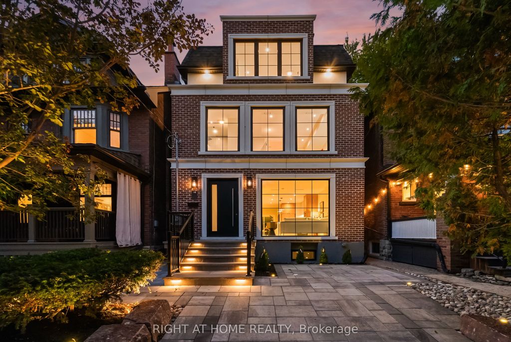 Photo of 98 Dixon Avenue, Toronto, ON M4L 1N7 (MLS # E12467383)