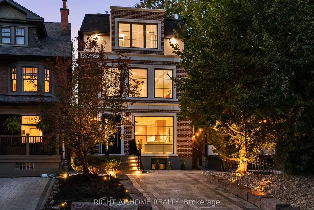 Photo of 98 Dixon Avenue, Toronto, ON M4L 1N7 (MLS # E12467383)