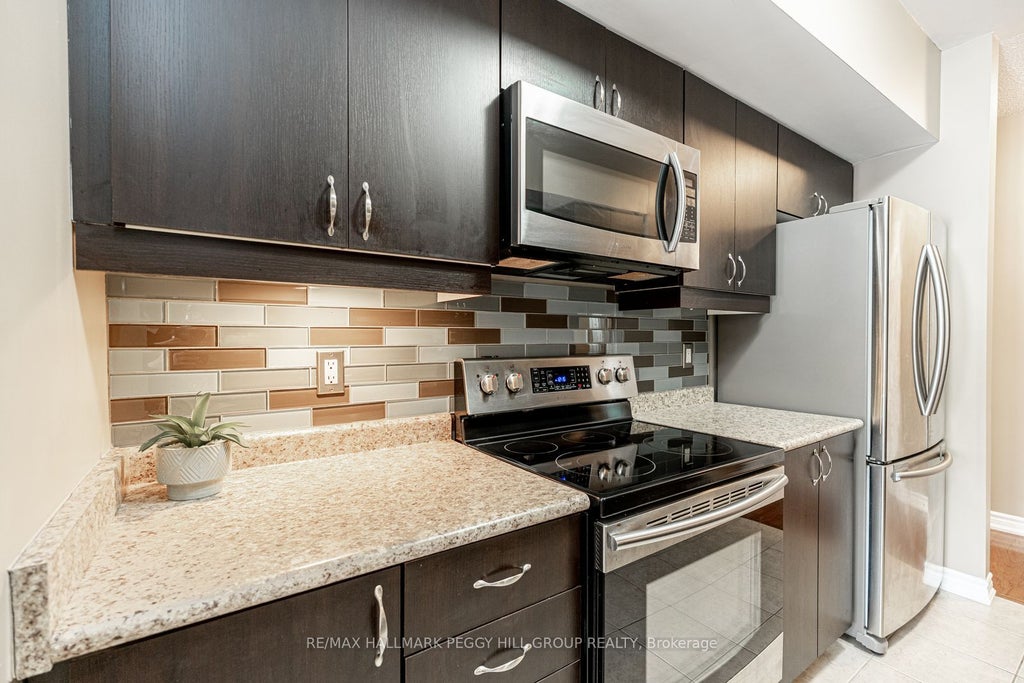Photo of 39 Ferndale Drive S #112, Barrie, ON L4N 5T5 (MLS # S14116876)