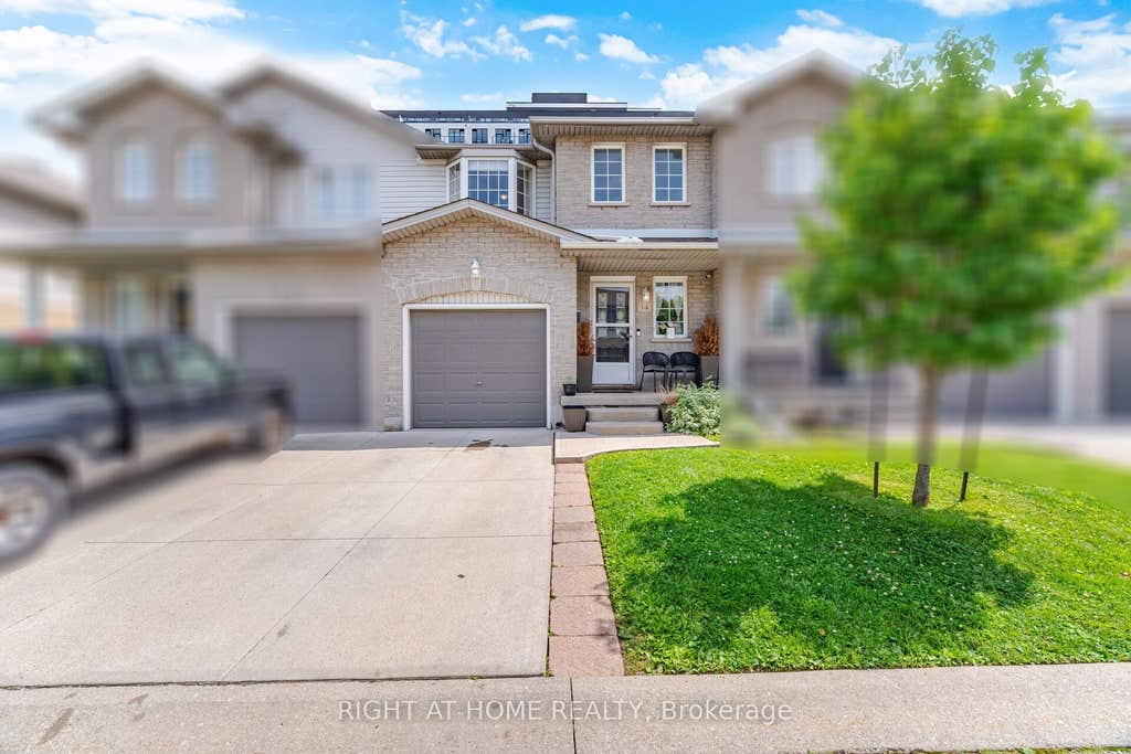 Photo of 104 Frances Avenue #14, Hamilton, ON L8E 5X3 (MLS # X13716498)