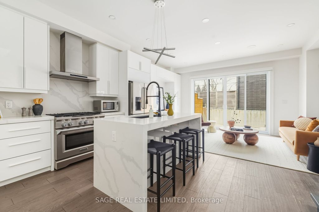 Photo of 99A Memorial Park Avenue, Toronto, ON M4J 2K1 (MLS # E13024606)