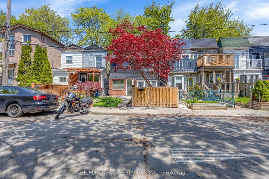 Photo of 827 Craven Road, Toronto, ON M4L 2Z7 (MLS # E13141114)
