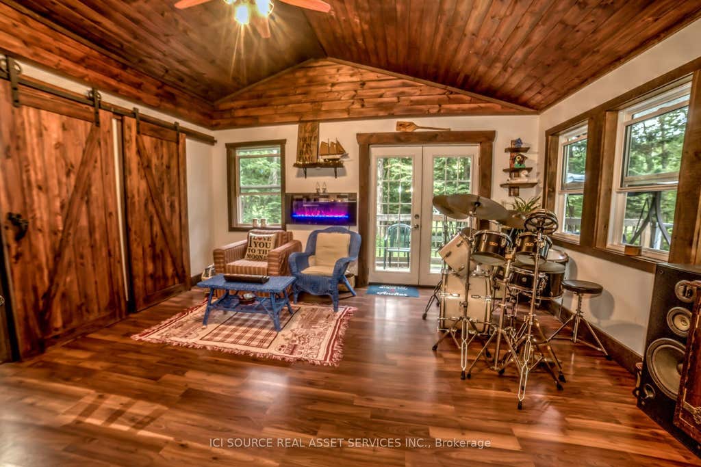 Photo of 1218 Milford Bay Road #Unit 5, Muskoka Lakes, ON P0B 1E0 (MLS # X13554064)