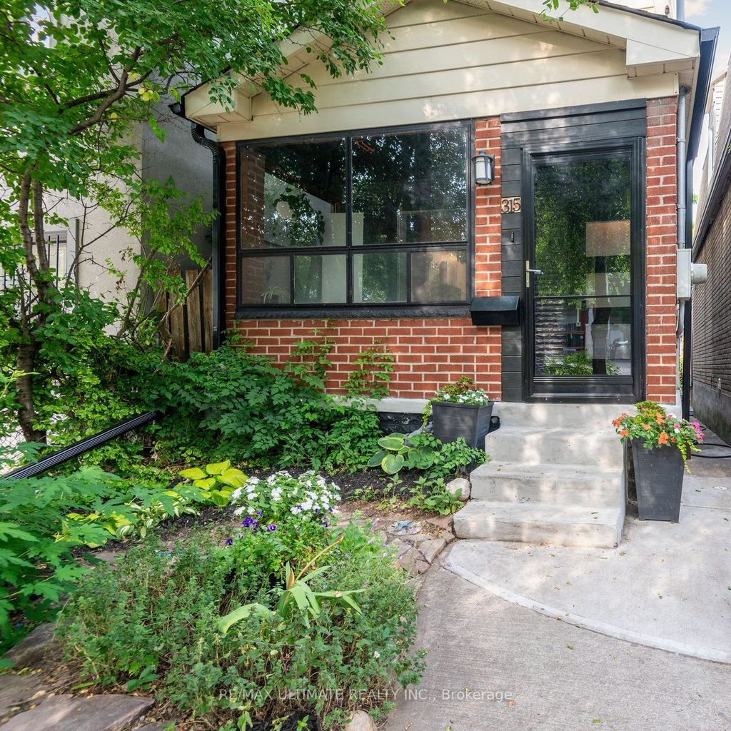 Photo of 315 Cedarvale Avenue, Toronto, ON M4C 4K3 (MLS # E12438603)