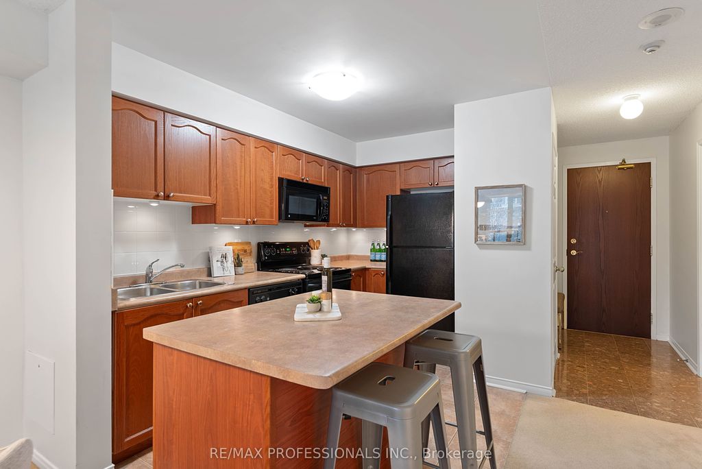 Photo of 7 Michael Power Place #206, Toronto, ON M9A 0A4 (MLS # W12895608)