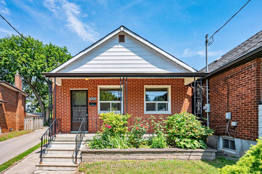 Photo of 970 Cosburn Avenue, Toronto, ON M4C 2W9 (MLS # E13505904)