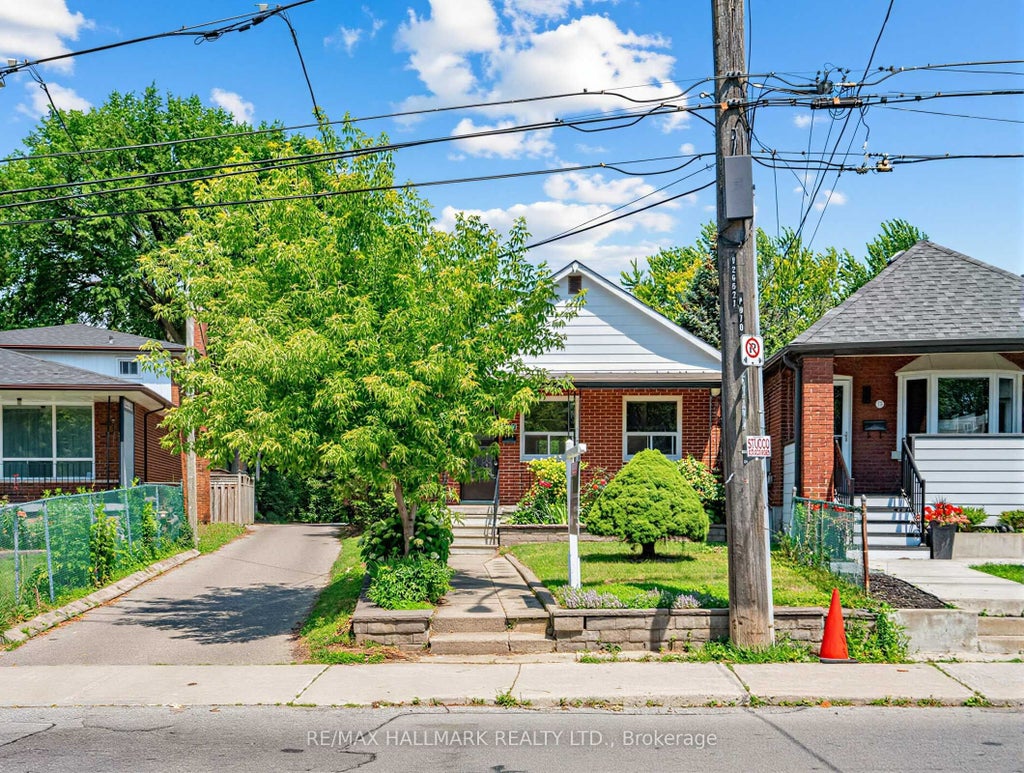 Photo of 970 Cosburn Avenue, Toronto, ON M4C 2W9 (MLS # E13505904)