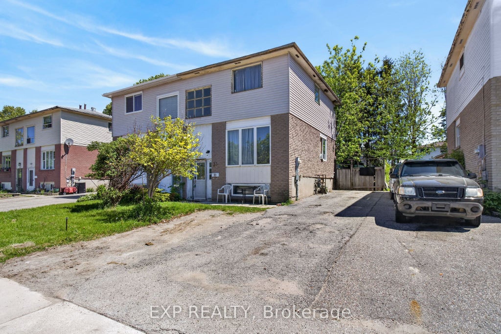 Photo of 33 Carlton Road, Barrie, ON L4M 5K8 (MLS # S13232038)