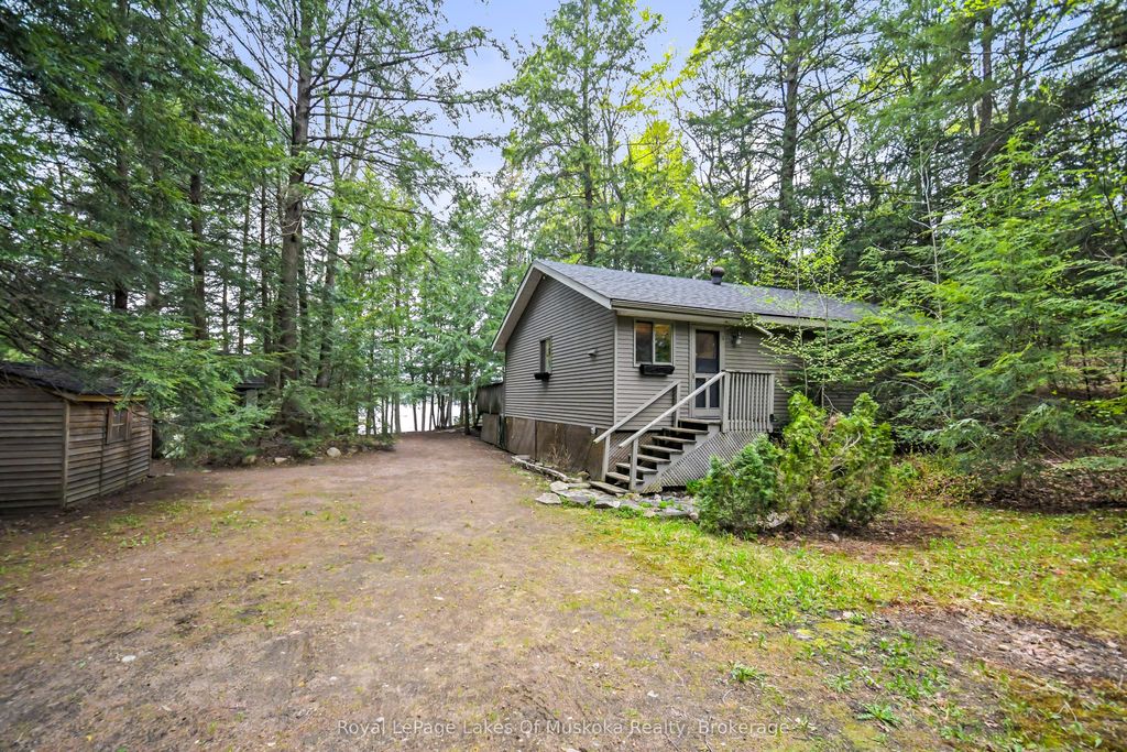 Photo of 1122 Bigwind Lake Road, Bracebridge, ON P1L 1X1 (MLS # X13165594)