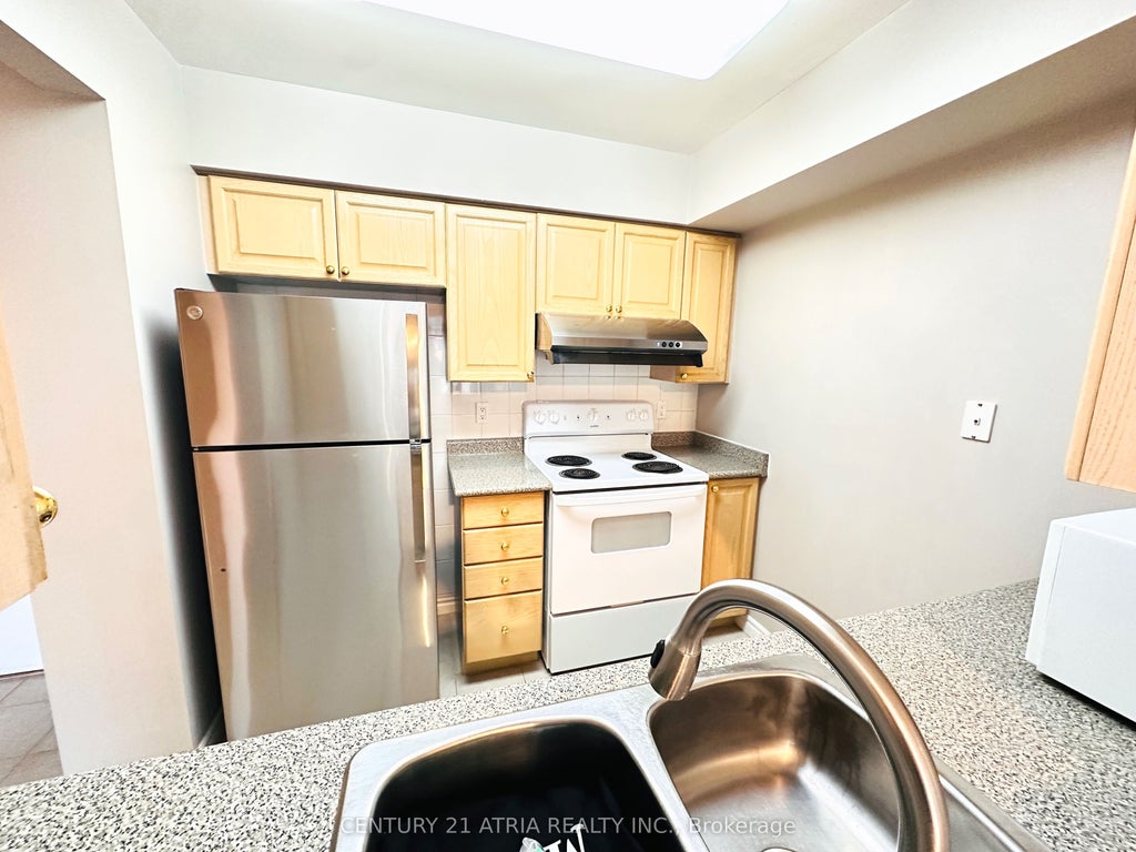 Photo of 3088 Kennedy Road #211, Toronto, ON M1V 5M4 (MLS # E14109554)