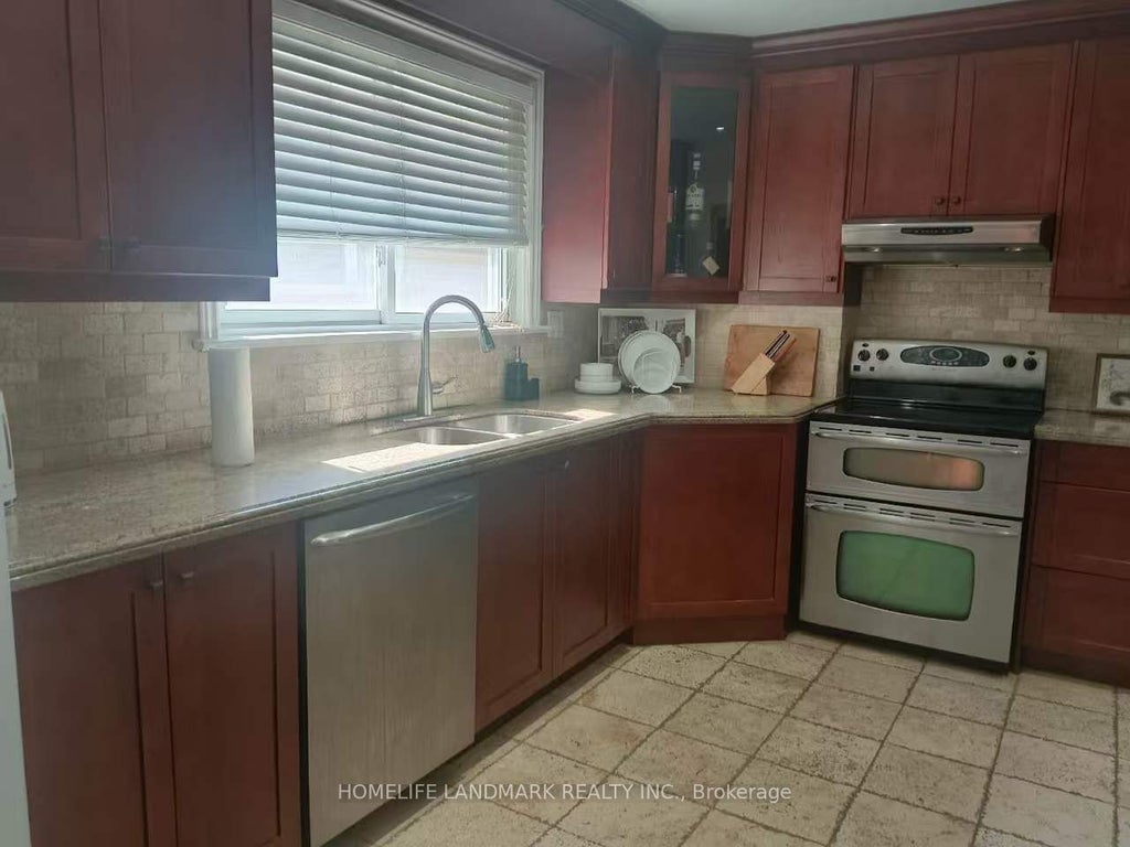 Photo of 40 Carsbrooke Road, Toronto, ON M9C 3C1 (MLS # W13523716)