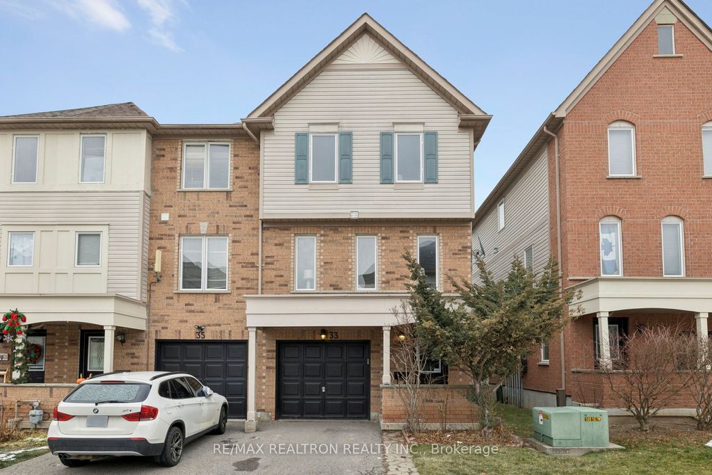 Photo of 33 Pennefather Lane #62, Ajax, ON L1T 4H1 (MLS # E12649252)