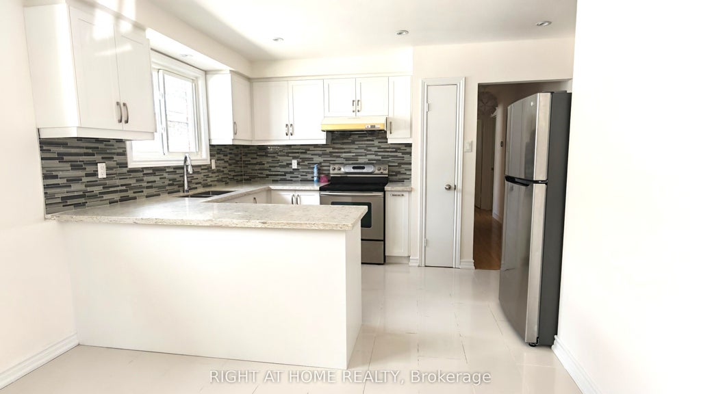Photo of 81 Heaslip Terrace, Toronto, ON M1T 1W8 (MLS # E13412670)