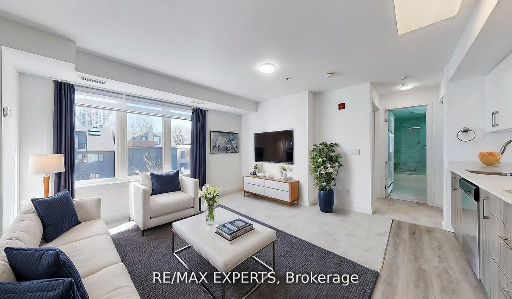 Photo of 45 Connaught Avenue #303, Toronto, ON M4L 2V8 (MLS # E13659904)