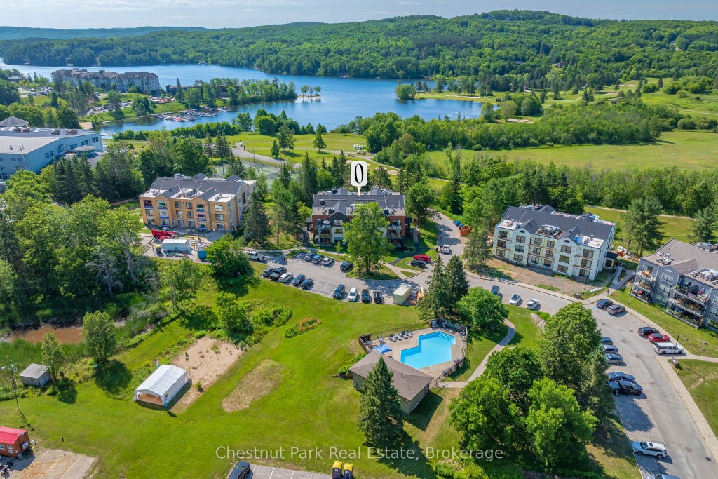 Photo of 1235 Deerhurst Summit Drive #52-101, Huntsville, ON P1H 2E8 (MLS # X13537984)
