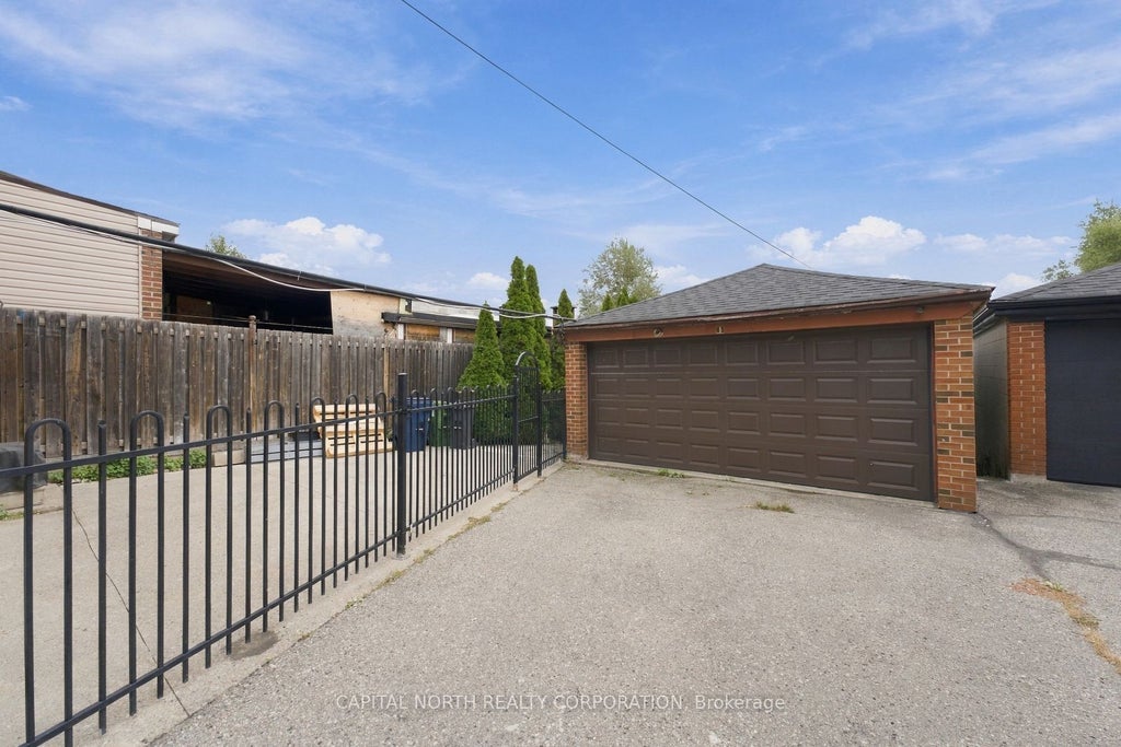 Photo of 65 Falstaff Avenue, Toronto, ON M6L 2E2 (MLS # W13862920)