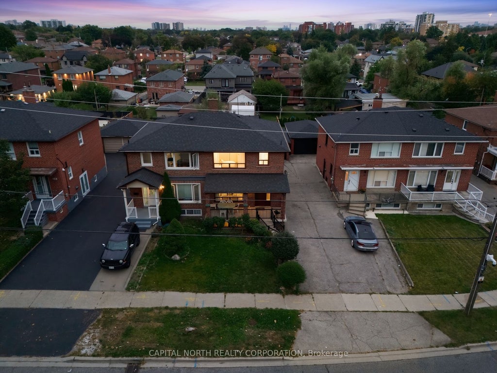 Photo of 65 Falstaff Avenue, Toronto, ON M6L 2E2 (MLS # W13862920)