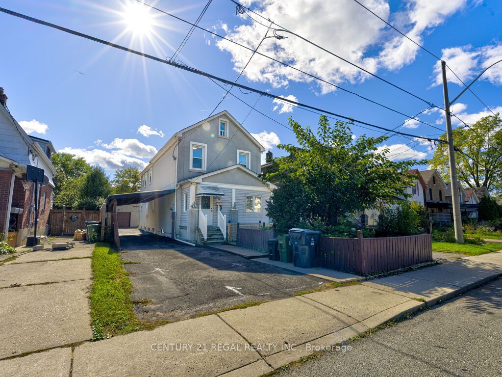 Photo of 11 Midburn Avenue, Toronto, ON M4C 2C8 (MLS # E12457114)