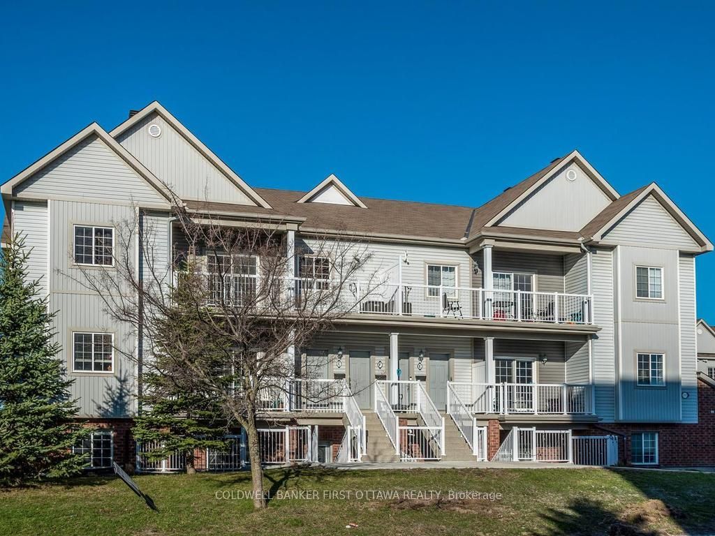 Photo of 100 Artesa Private #E, Kanata, ON K2S 0J8 (MLS # X13044326)