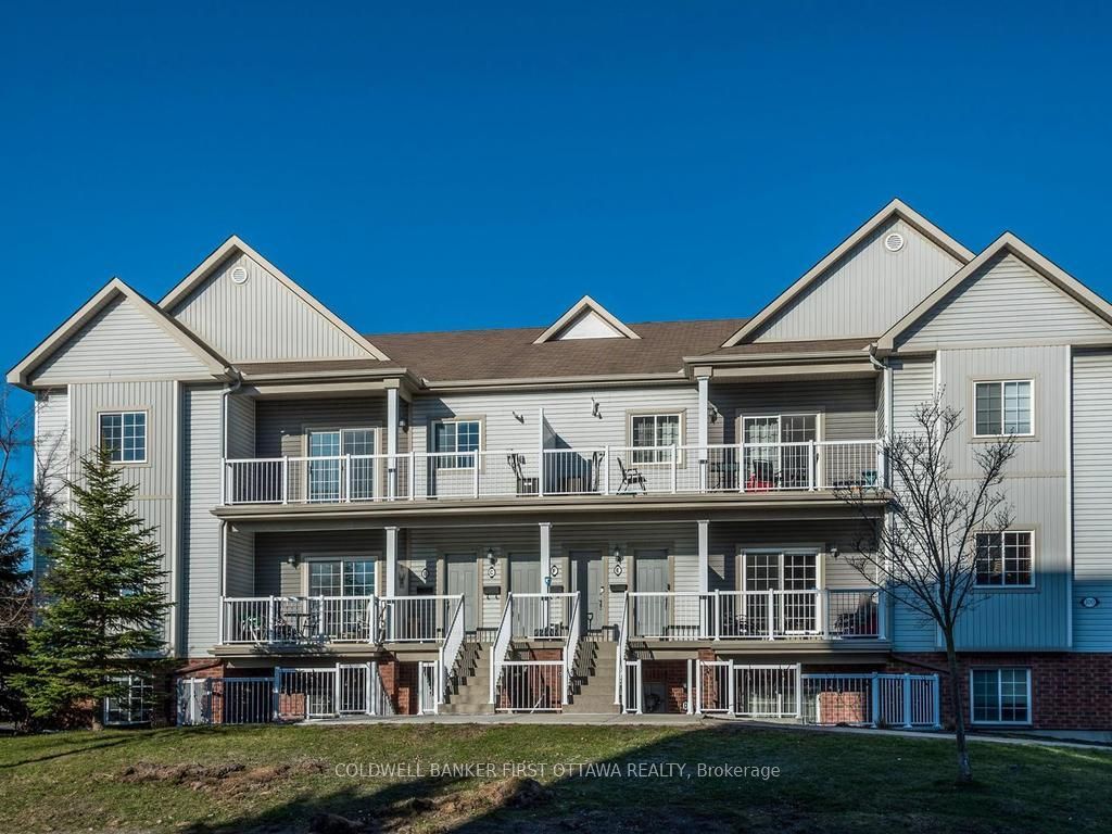 Photo of 100 Artesa Private #E, Kanata, ON K2S 0J8 (MLS # X13044326)