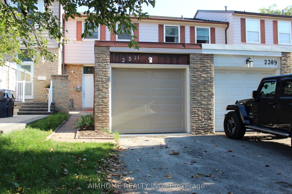 Photo of 2311 Bridletowne Circle, Toronto, ON M1W 2L3 (MLS # E13027584)