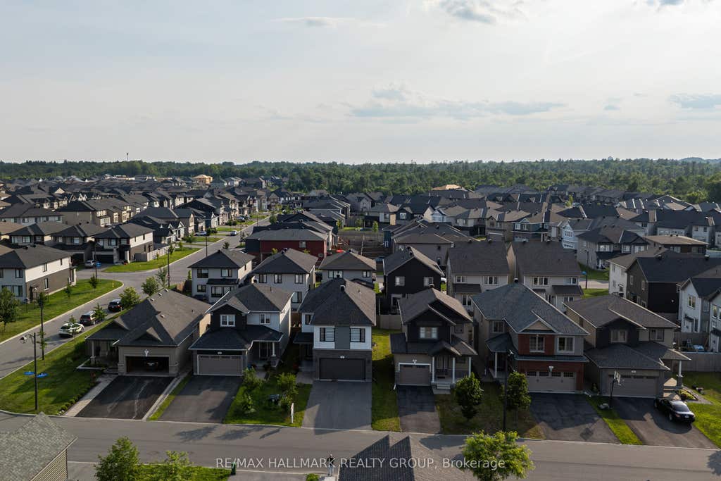 Photo of 57 Zaatiik Grove, Blossom Park - Airport and Area, ON K1X 0E5 (MLS # X13510028)