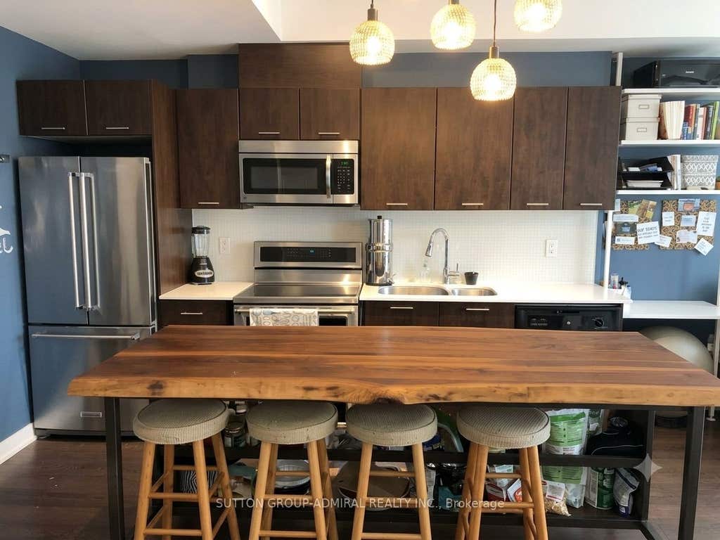 Photo of 20 Bruyeres Mews #217, Toronto, ON M5V 0G8 (MLS # C13561980)