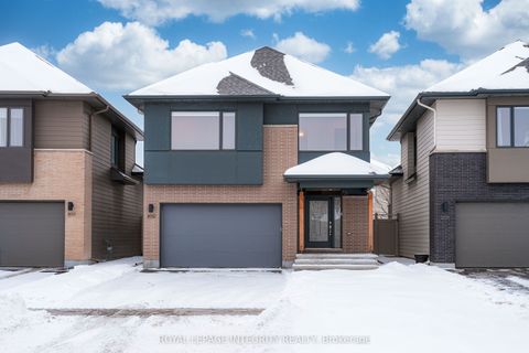 Photo of 899 Ralph Hennessy Avenue, Blossom Park - Airport and Area, ON K1X 0B1 (MLS # X12681076)