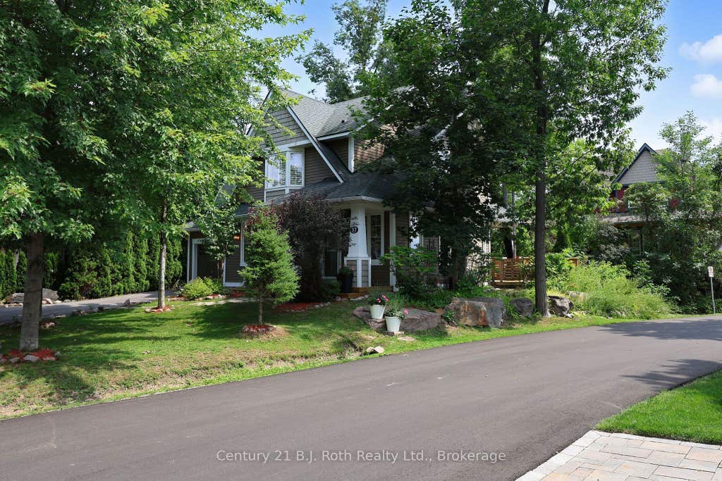 Photo of 37 Country Trail, Georgian Bay, ON L0K 1S0 (MLS # X13679844)