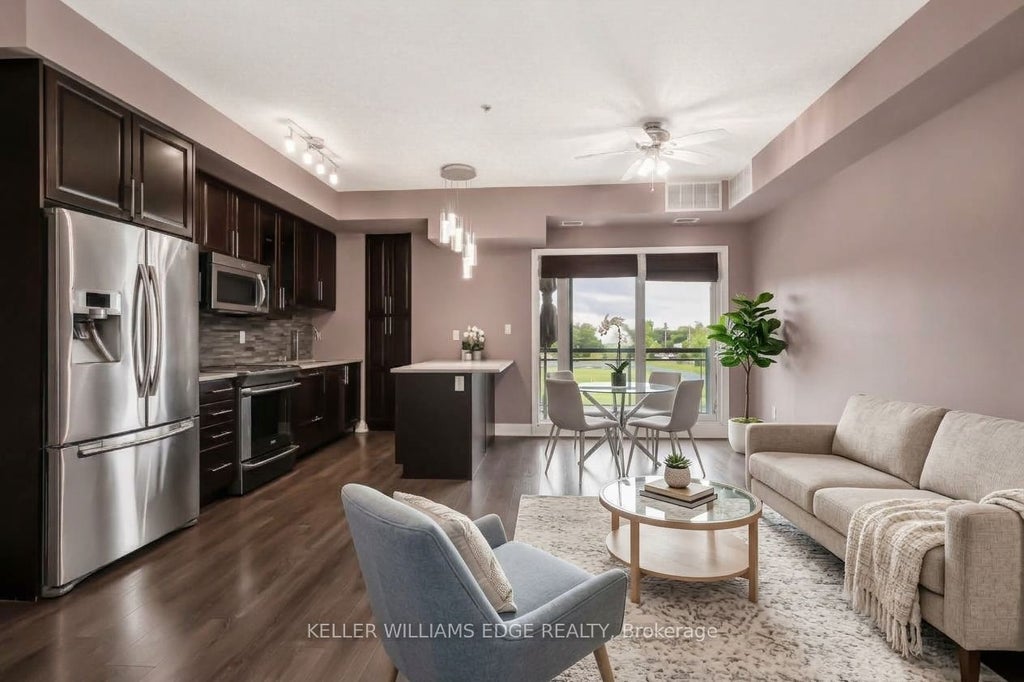 Photo of 128 Garden Drive #413, Oakville, ON L6K 0H7 (MLS # W14029024)