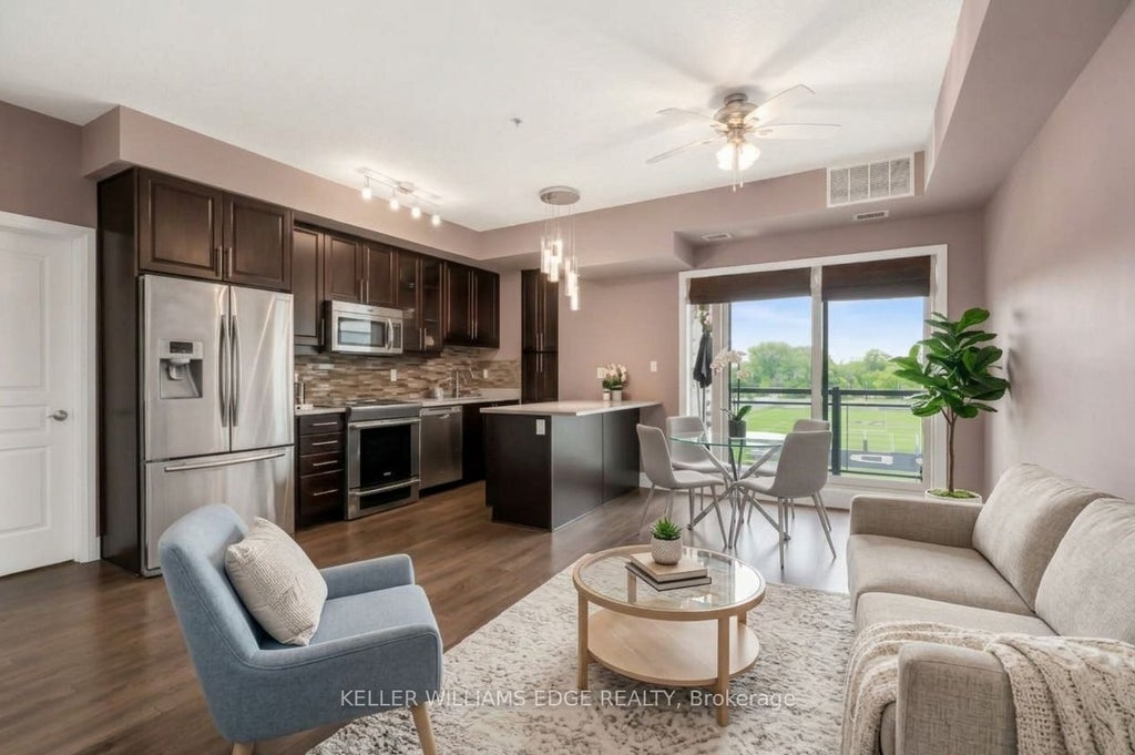 Photo of 128 Garden Drive #413, Oakville, ON L6K 0H7 (MLS # W14029024)