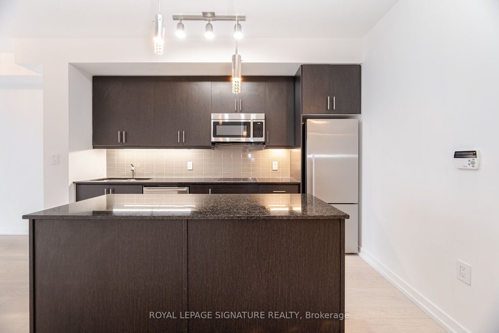 Photo of 1 The Esplanade Drive #1501, Toronto, ON M5E 0A8 (MLS # C12449887)