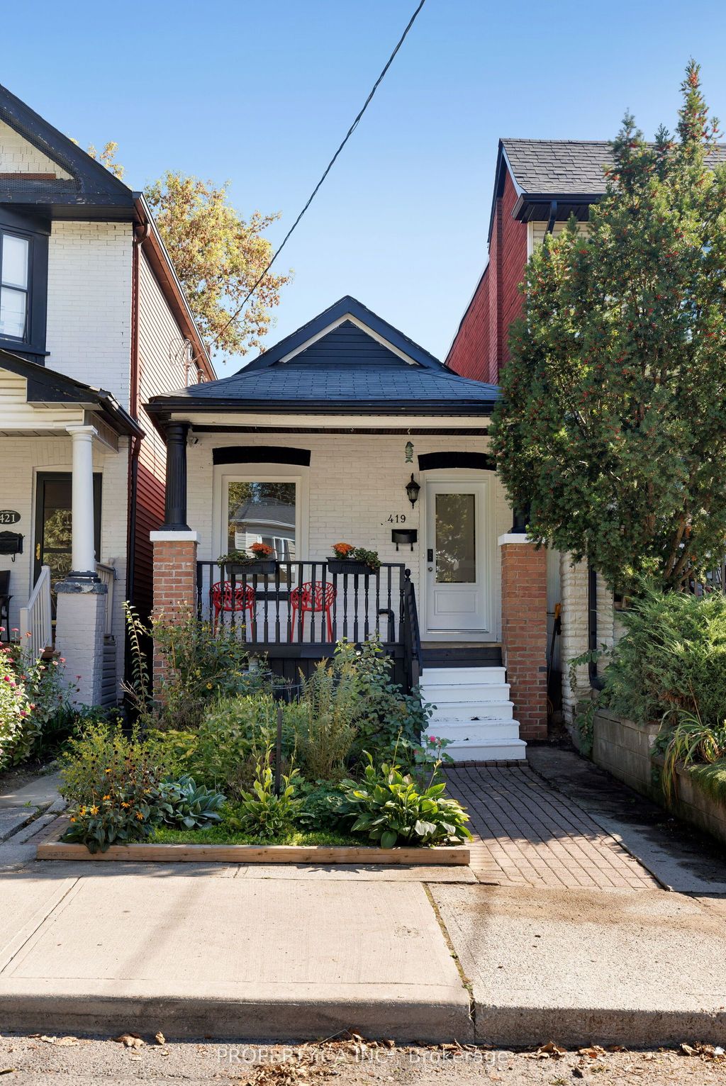 Photo of 419 RHODES Avenue, Toronto, ON M4L 3A6 (MLS # E12436679)