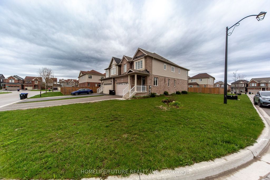 Photo of 5 Hutton Crescent, Essa, ON L0M 1B6 (MLS # N13156832)