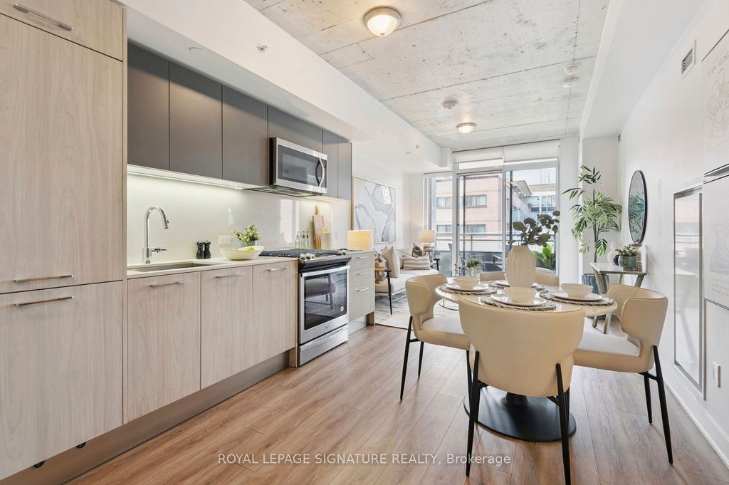Photo of 665 Kingston Road #407, Toronto, ON M4E 0B6 (MLS # E12427730)