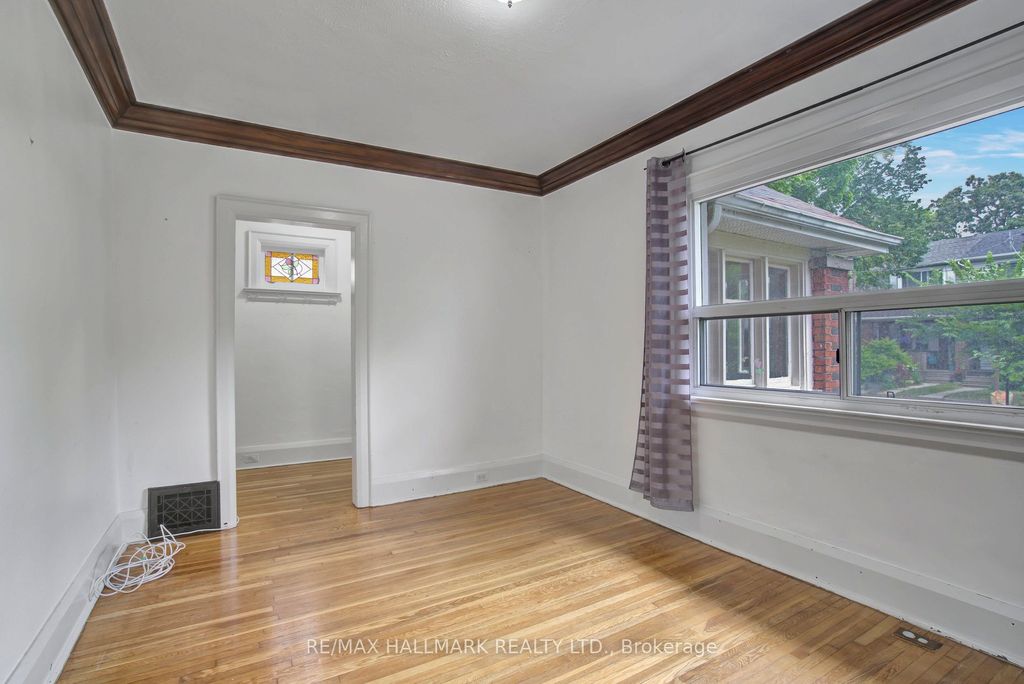 Photo of 9 Costain Avenue, Toronto, ON M4E 2G7 (MLS # E12405279)