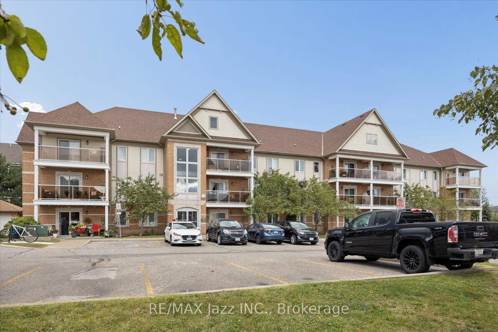 Photo of 120 Aspen Springs Drive #204, Clarington, ON L1C 0G7 (MLS # E13711218)