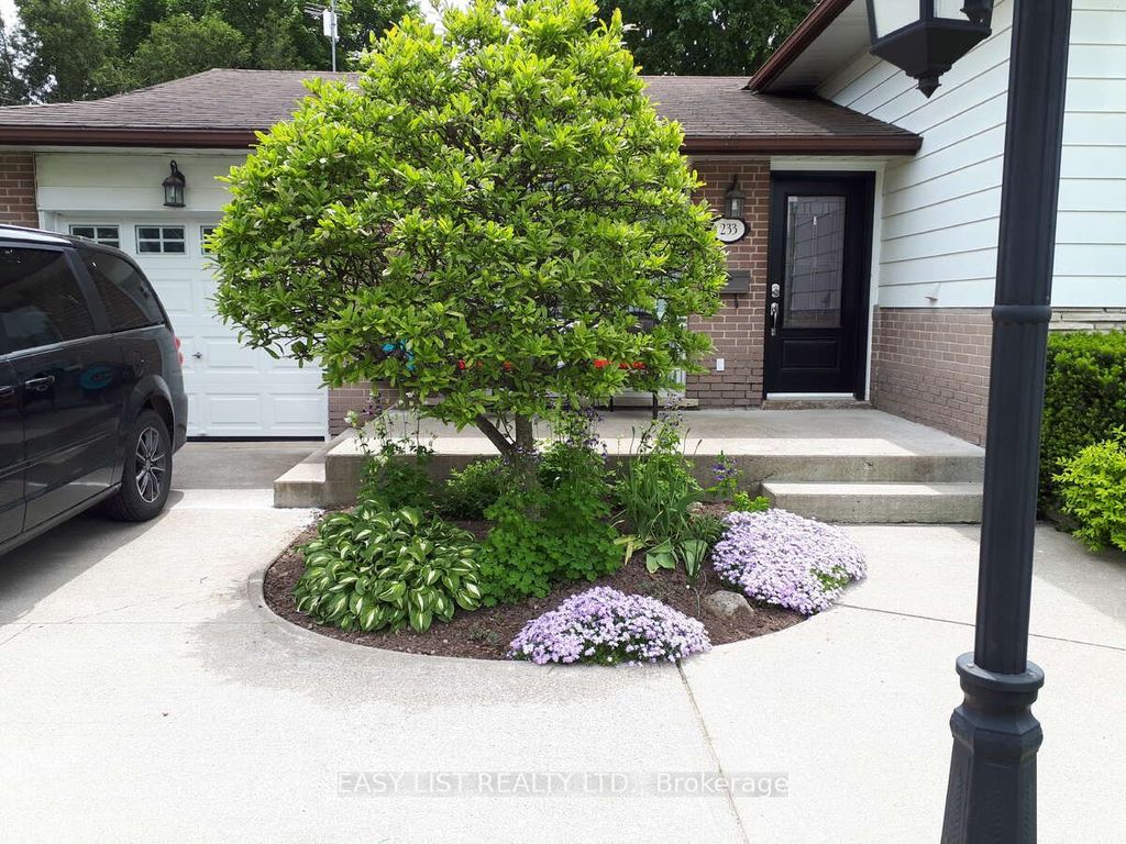 Photo of 233 Elmore Drive, Halton Hills, ON L7J 1T8 (MLS # W13046152)