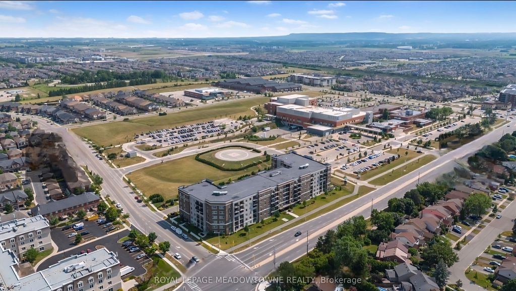 Photo of 610 Farmstead Drive #324, Milton, ON L9T 8X5 (MLS # W12650296)