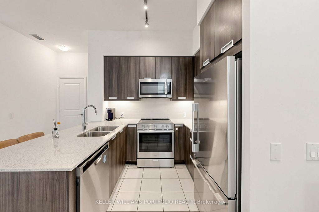 Photo of 35 Watergarden Drive #112, Mississauga, ON L5R 0G8 (MLS # W13934484)