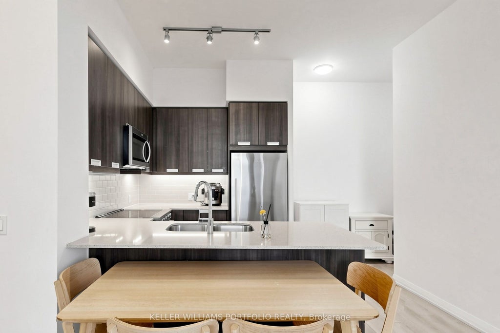 Photo of 35 Watergarden Drive #112, Mississauga, ON L5R 0G8 (MLS # W13934484)