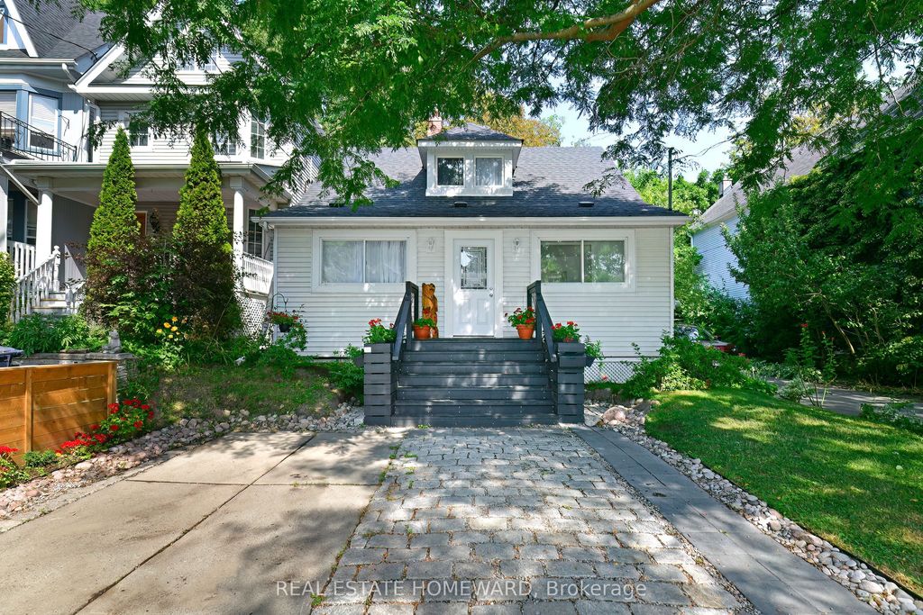Photo of 11 Elmer Avenue, Toronto, ON M4L 3R6 (MLS # E12398754)
