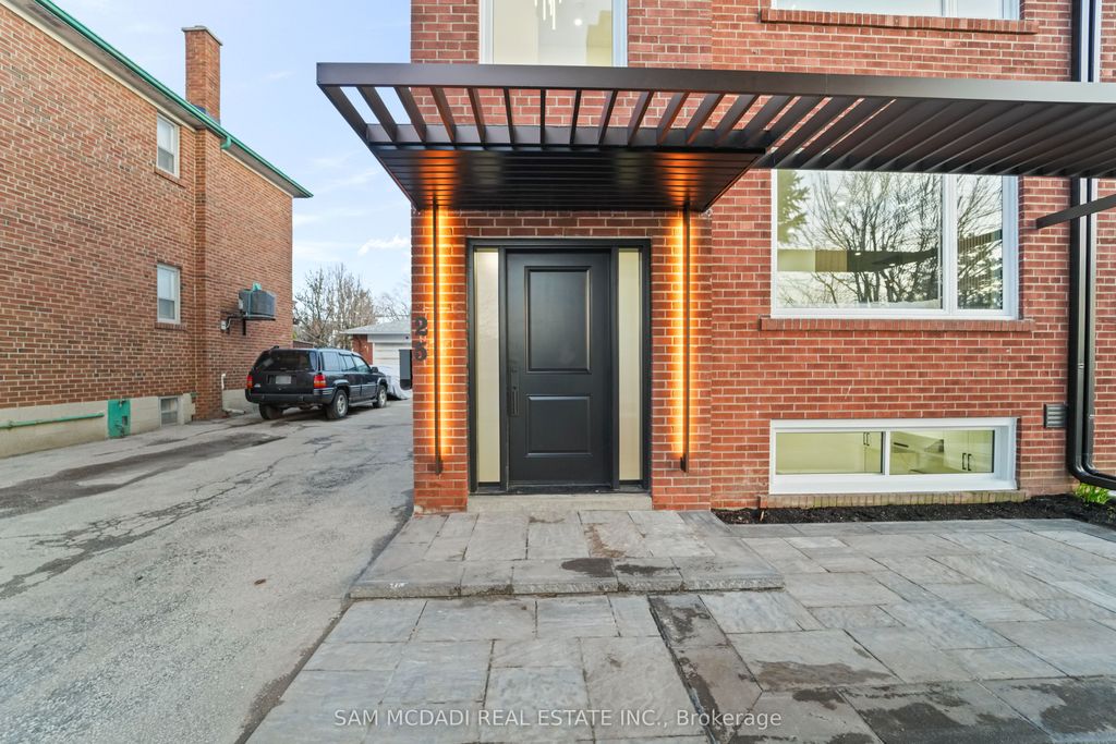 Photo of 25 Falstaff Avenue, Toronto, ON M6L 2C6 (MLS # W13022820)