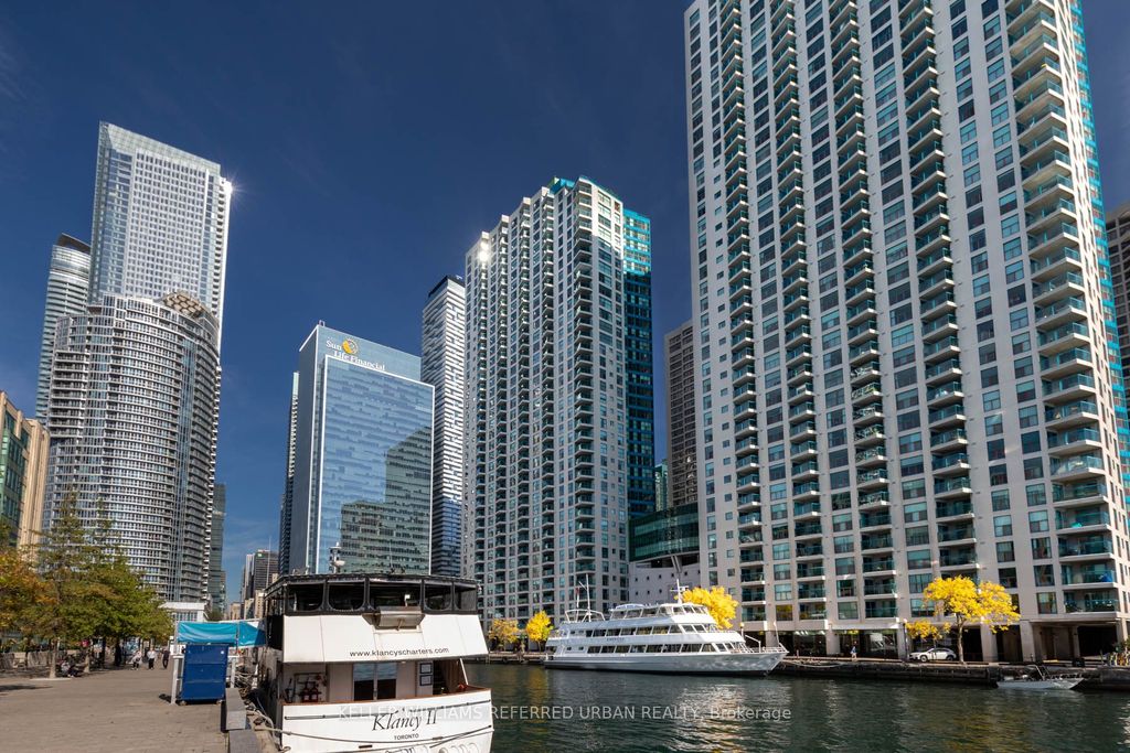 Photo of 77 Harbour Square #302, Toronto, ON M5J 2S2 (MLS # C12397415)