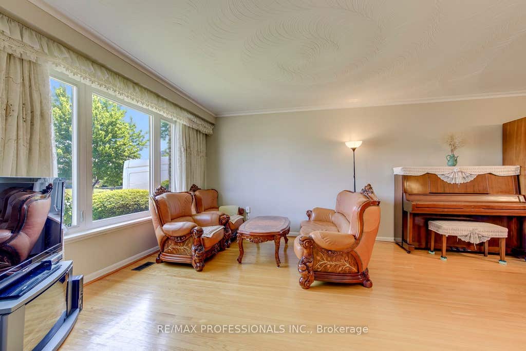 Photo of 256 Wellesworth Drive, Toronto, ON M9C 4S6 (MLS # W13567618)