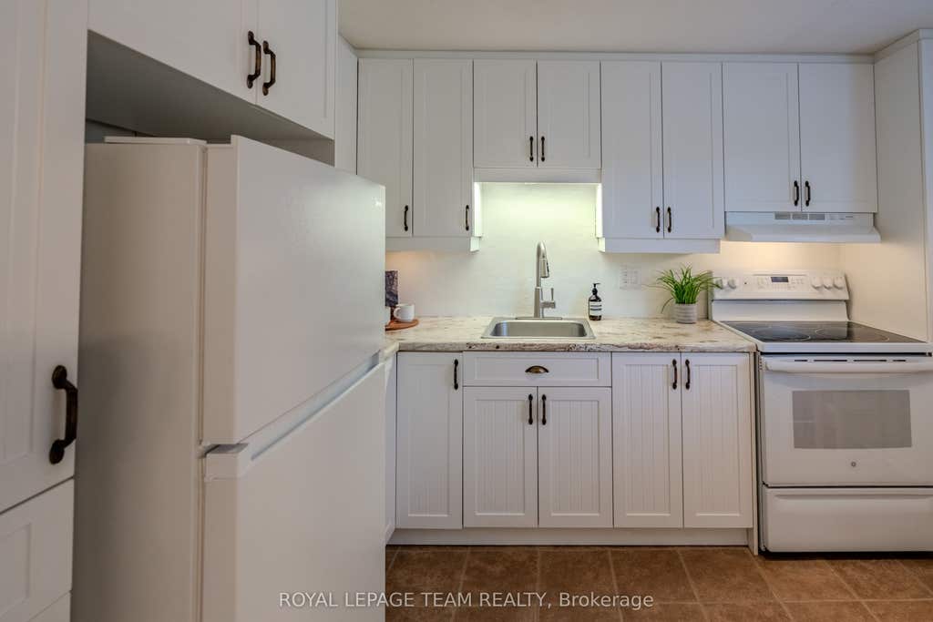 Photo of 2 Larkshire Lane #B, Barrhaven, ON K2J 1Y6 (MLS # X13716428)