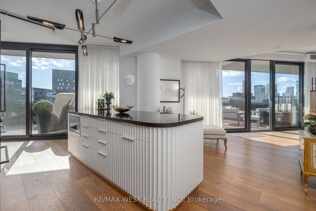 Photo of 21 Lawren Harris Square #1002, Toronto, ON M5A 0T4 (MLS # C14027810)