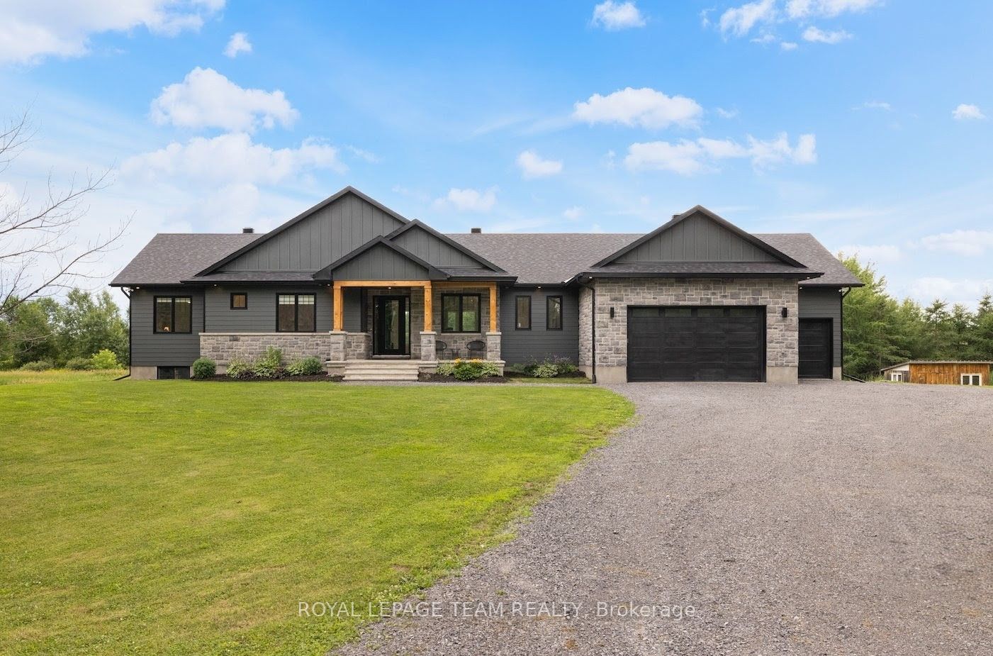 Heated triple garage w/ access to both levels