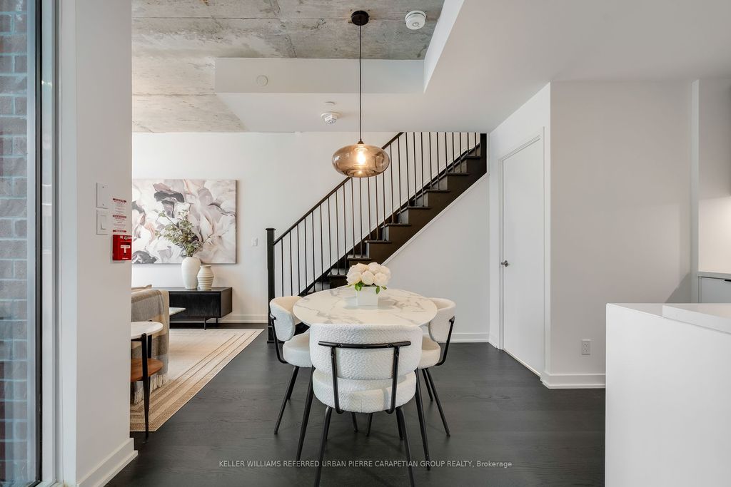 Photo of 57 Brock Avenue #TH 109, Toronto, ON M6K 0H3 (MLS # W12343942)